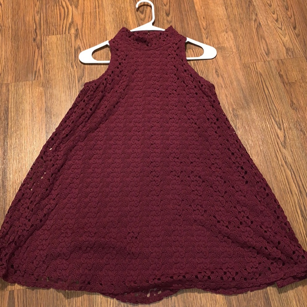 Women’s size small mid length burgundy lace dress.